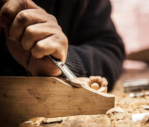 Rice Furniture & Design Center | furniture designing building a custom piece of furniture with a carving tool Rice Furniture & Design Center | furniture designing building a custom piece of furniture with a carving tool